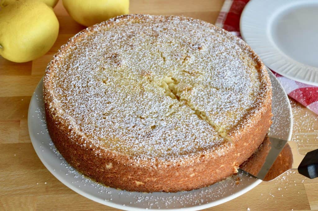 serving knife pulling out a slice of cake.