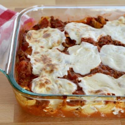Cheese & Meat Stuffed Shells in a glass baking dish.