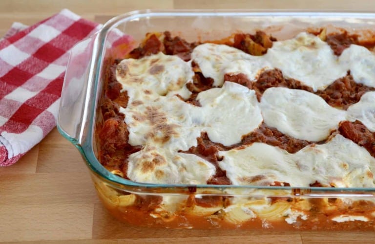 Cheese & Meat Stuffed Shells in a glass baking dish.