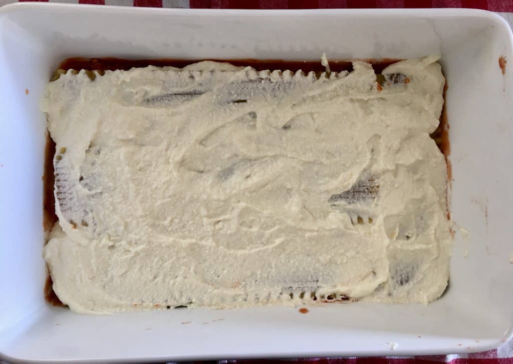 ricotta cheese mixture spread overtop of the no-bake lasagna noodles.