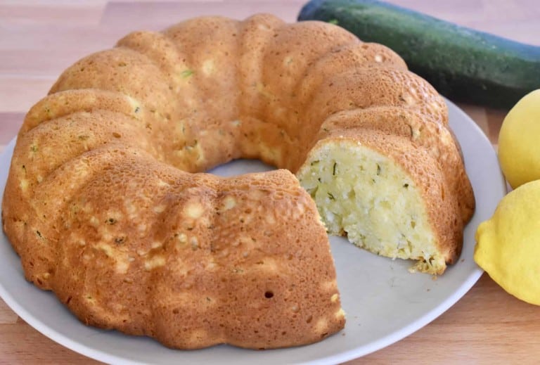 Slice of cake removed from the zucchini ricotta bundt cake.