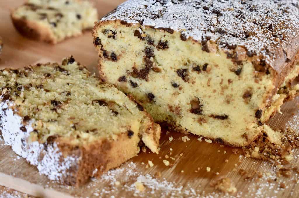 Cannoli Pound Cake on a wood cutting board.