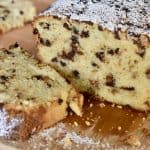 Cannoli Pound Cake on a wood cutting board.