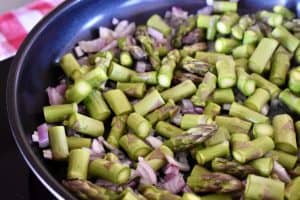 asparagus, shallots, and olive oil in a skillet.