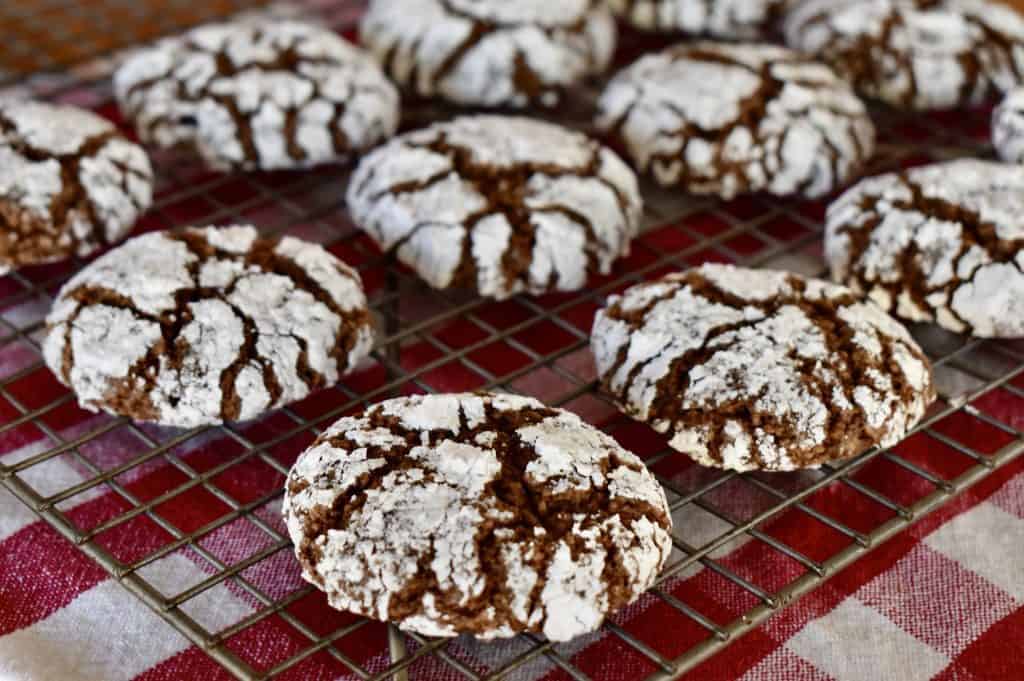 Italian Almond Chocolate Cookies cooling on wire cooling rack.