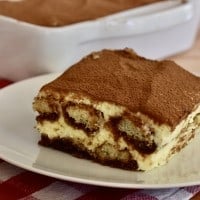 Tiramisu Recipe on a white plate.