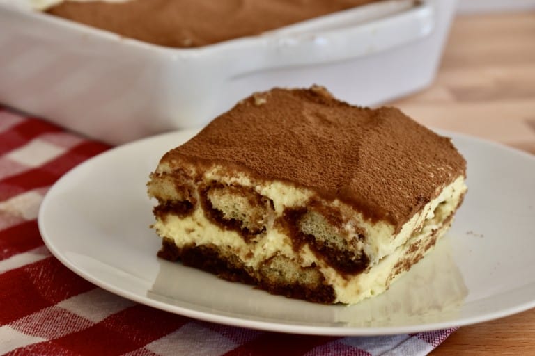 Tiramisu Recipe on a white plate.