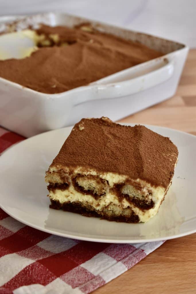 Tiramisu on a white plate.