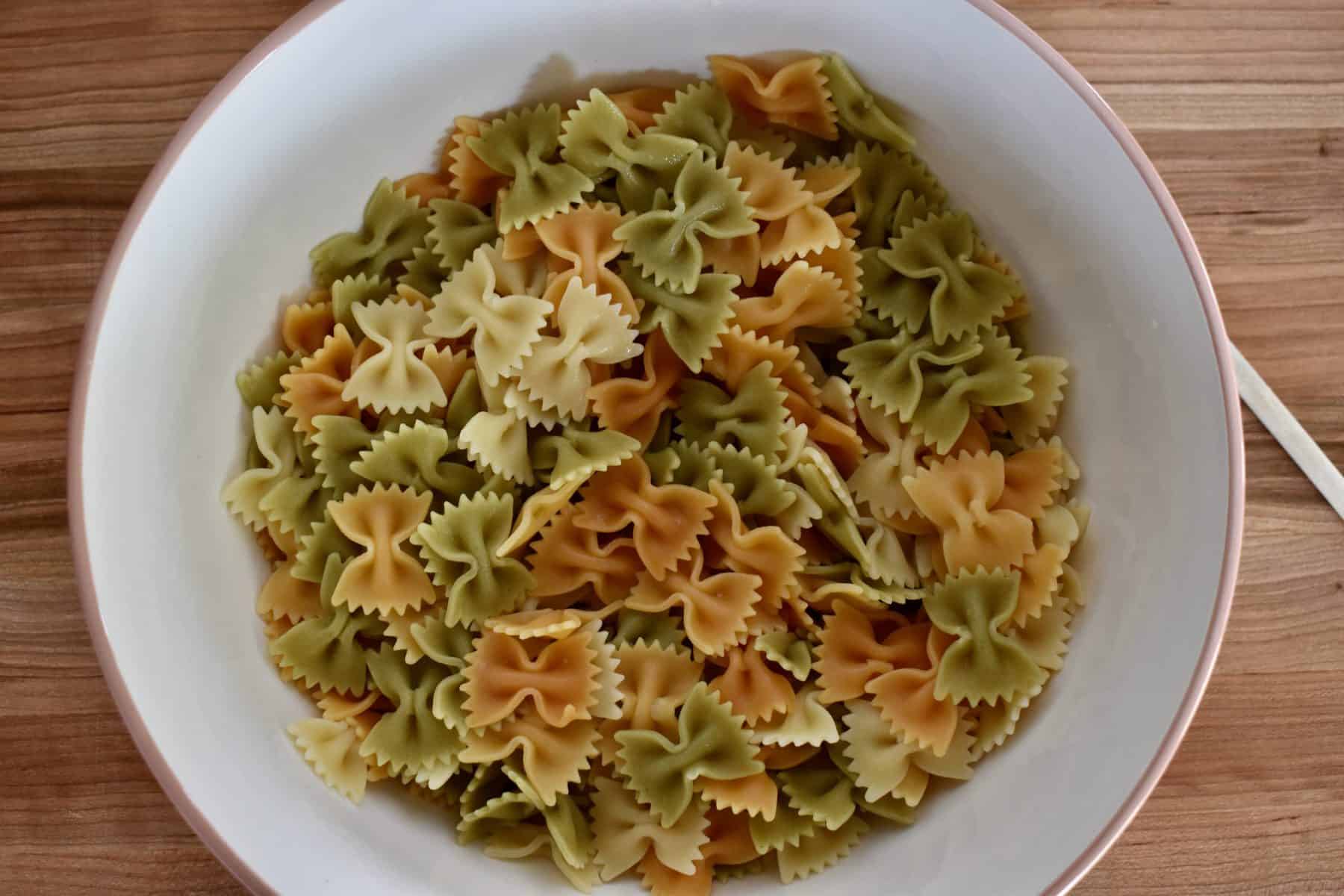 Cooked Farfalle in a large mixing bowl. 