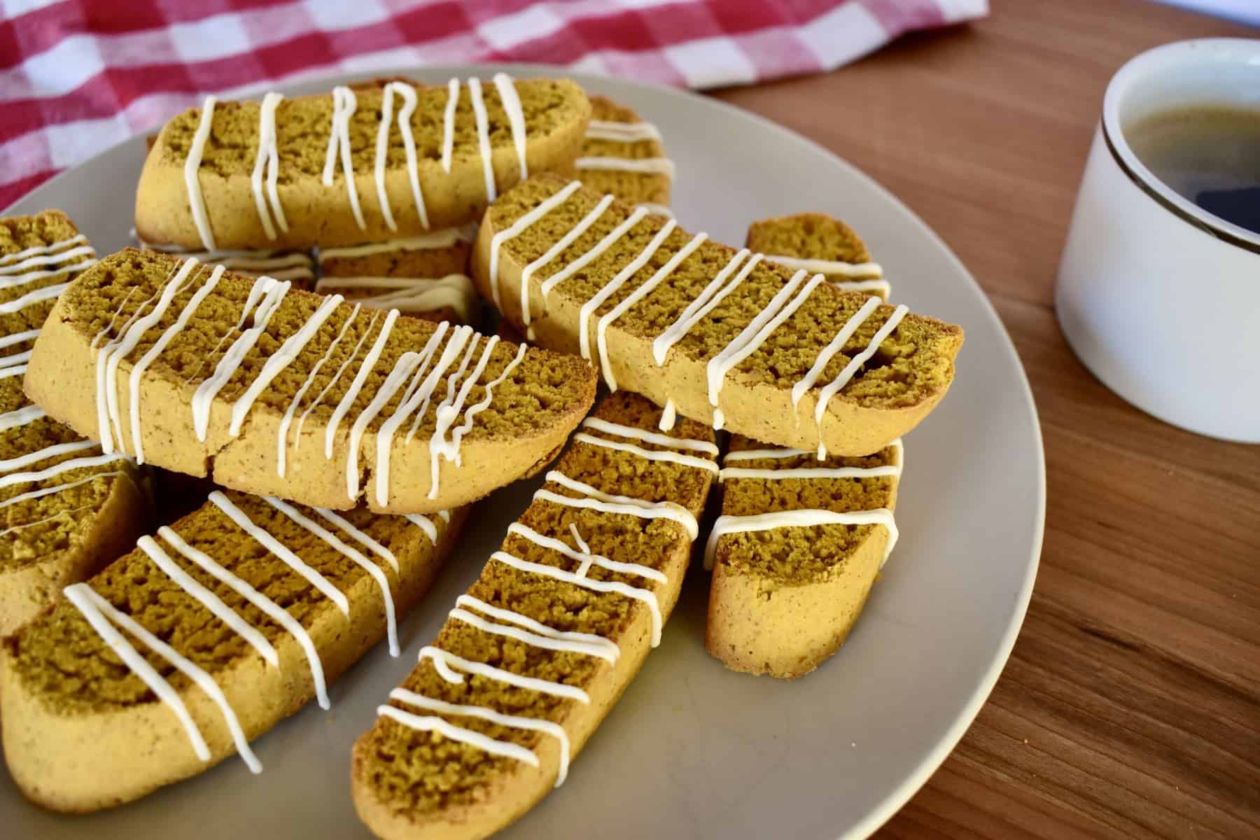 Italian cookies on a plate with a cup of coffee. 