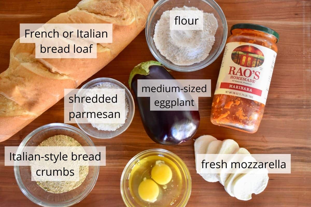 overhead photo of ingredients needed for the recipe including a french loaf, cheese, and marinara sauce. 