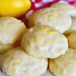 Lemon Ricotta Cookies on a counter with a checkered napkin in the background.