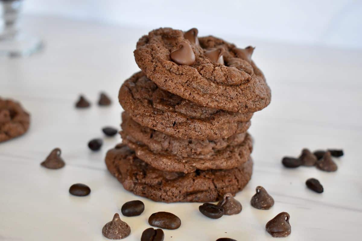 stack of chocolate espresso cookies on a white countertop. 