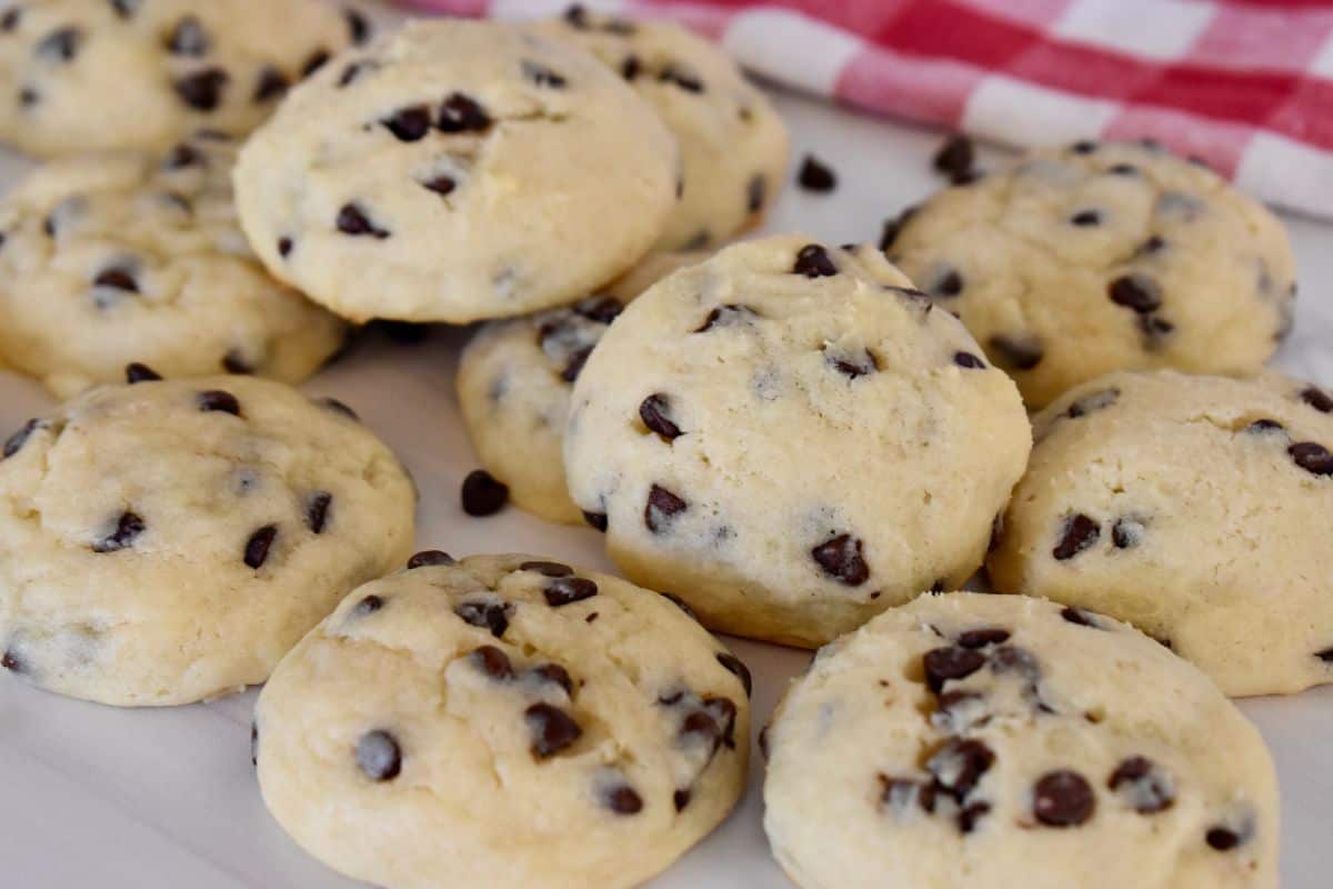 Chocolate Chip Ricotta Cookies on a counter with a checkered napkin in the background. 