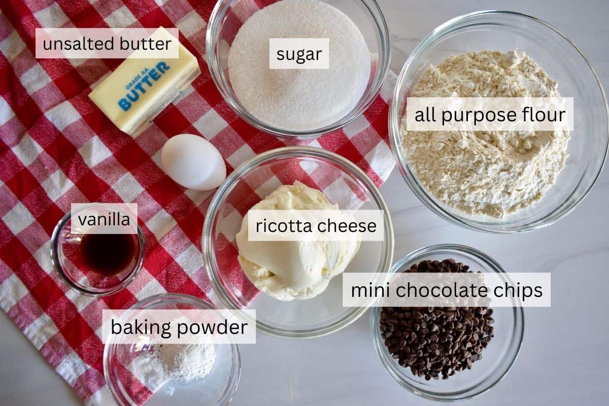 overhead photo of ingredients needed for recipe including flour, butter, egg, and vanilla. 