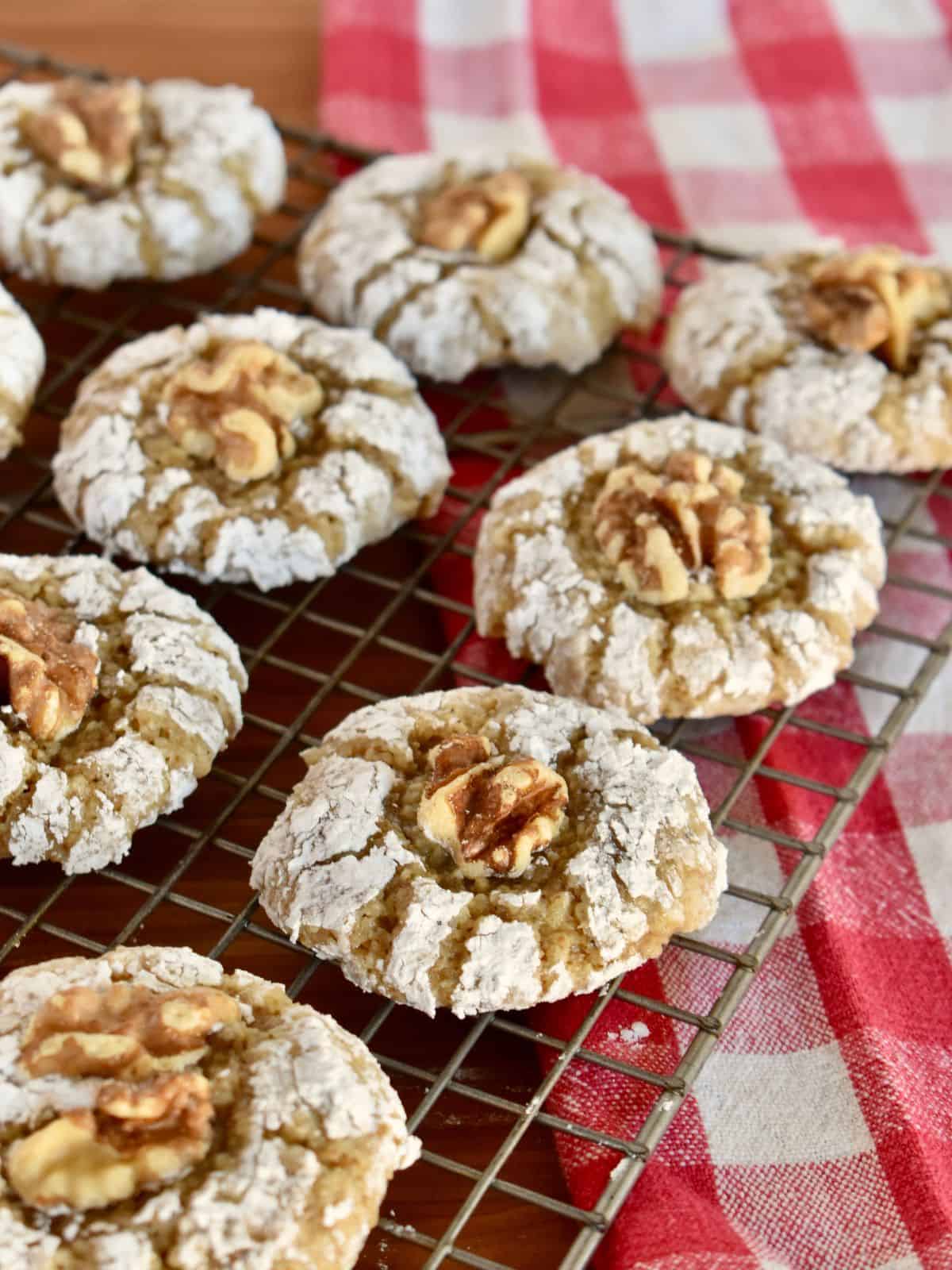 Italian Walnut Cookies on a wire cooling rack. 
