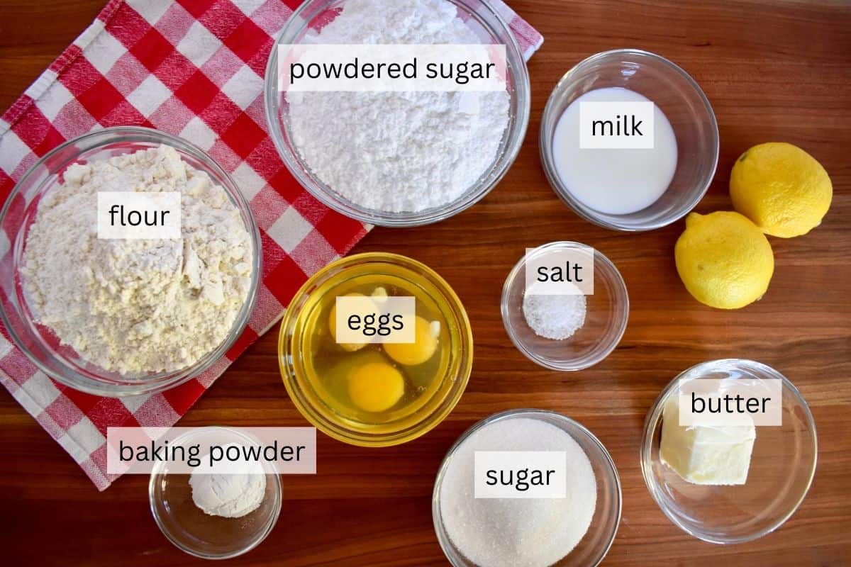 Ingredients including sugar, butter, flour, eggs, and powdered sugar. 