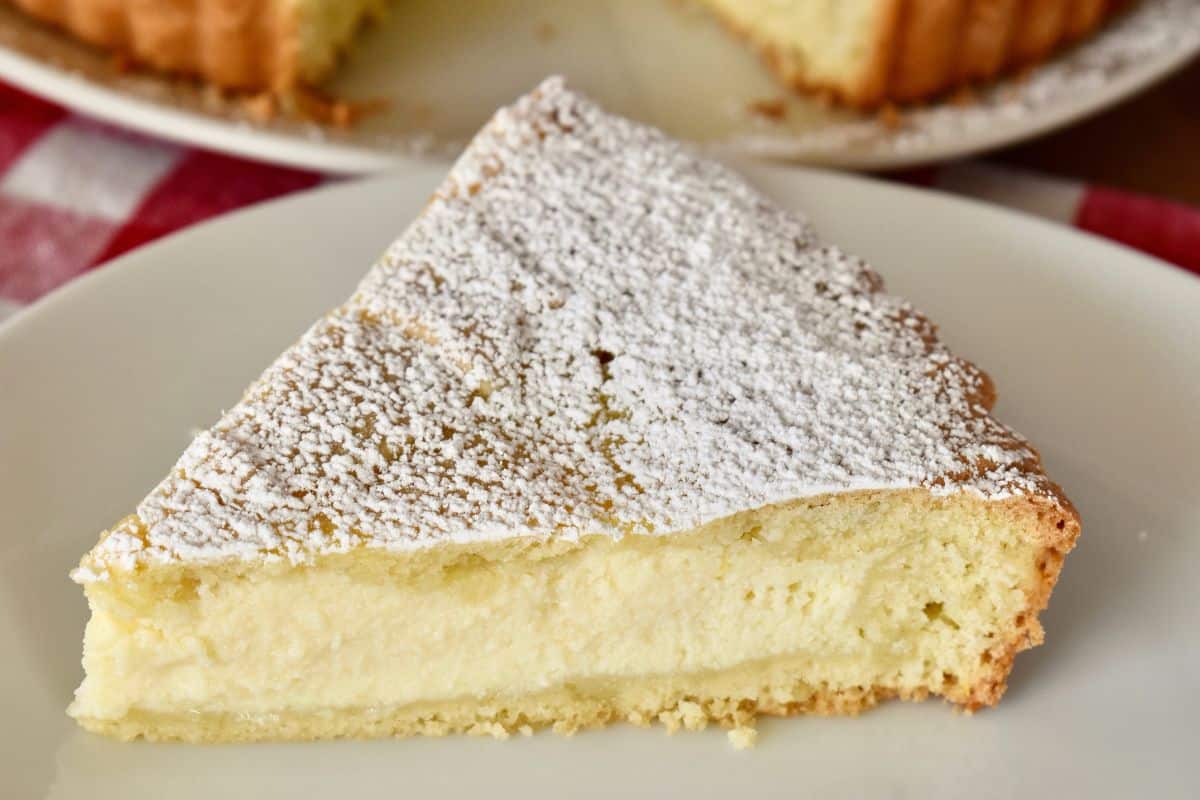 Italian Easter Pie known as Ricotta Pie on a white plate. 
