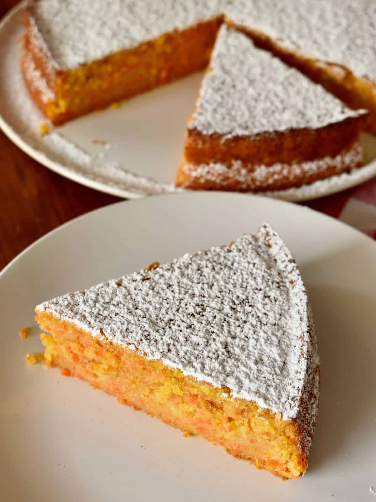 Italian Carrot Cake or torta di carote on a plate. 
