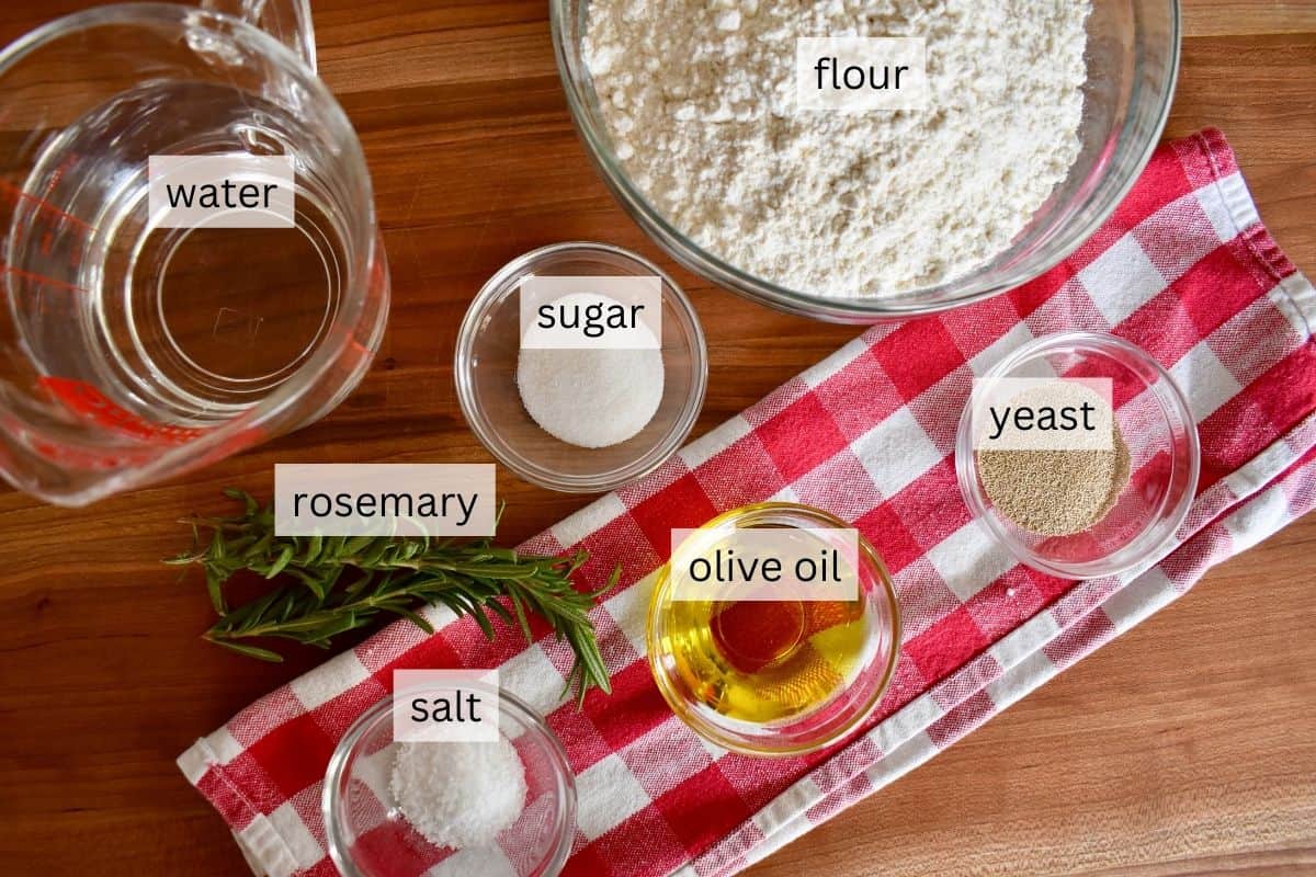 Ingredients for recipe include flour, sugar, olive oil, salt, yeast, and rosemary. 