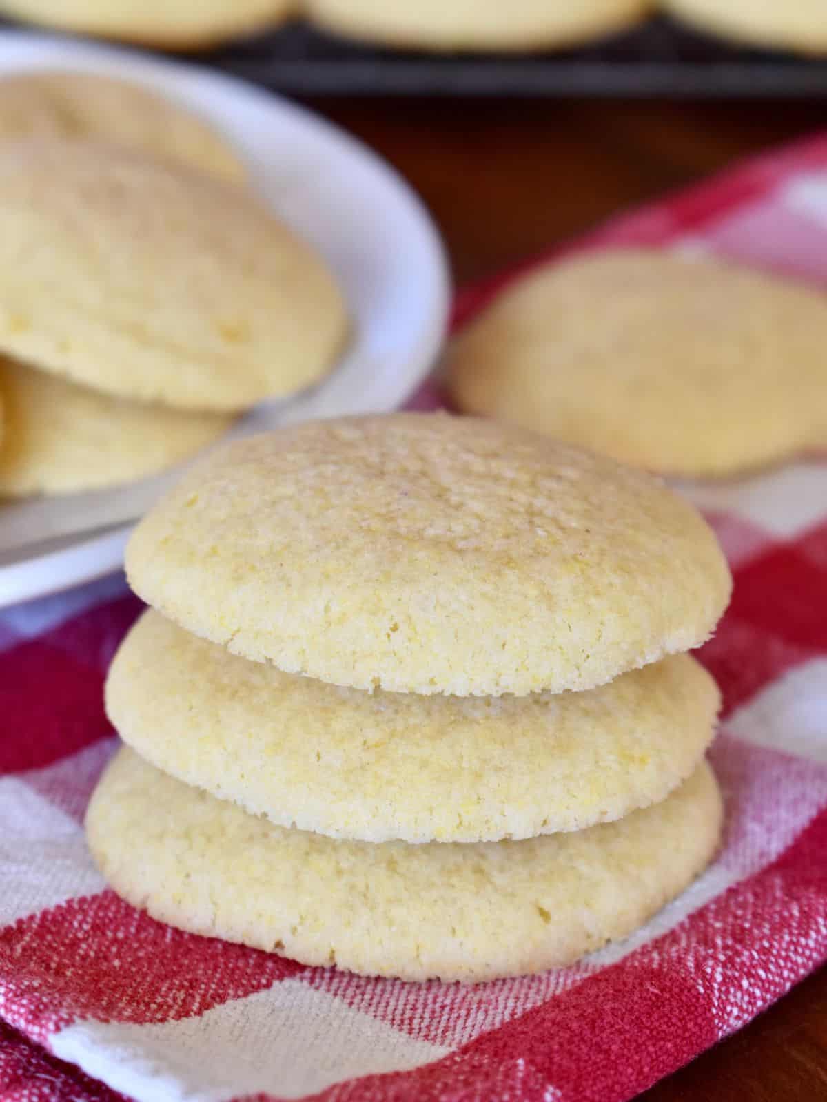 Three Italian cornmeal cookies stacked on each other. 