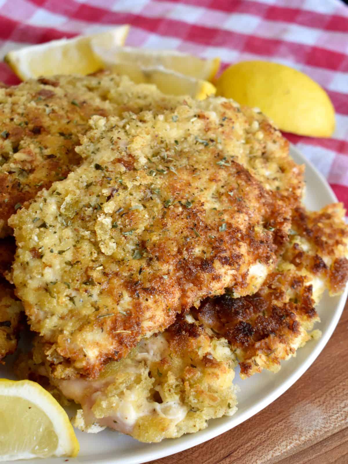 Italian Chicken Cutlets on a white plate. 