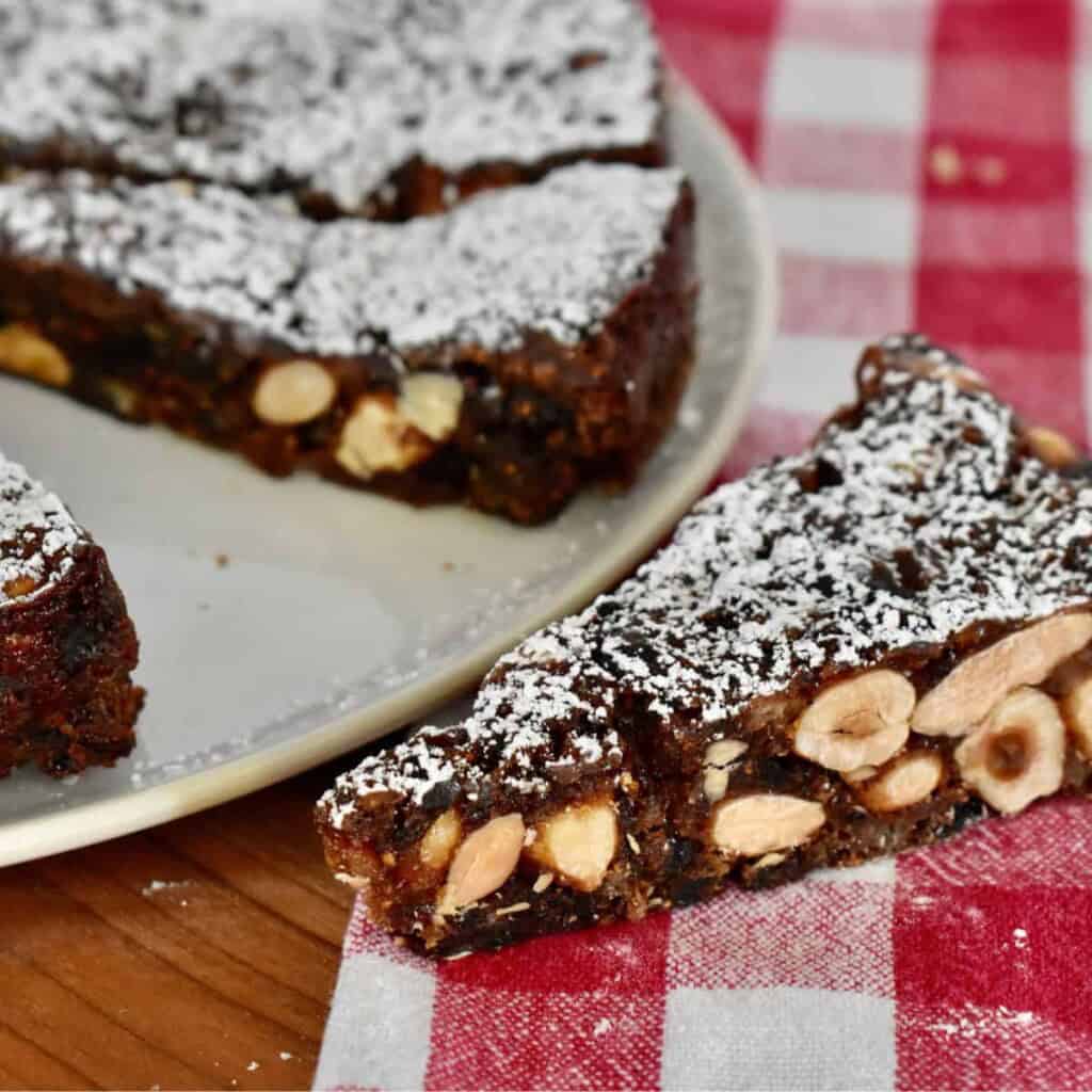 A chocolate Italian Christmas dessert dusted with powdered sugar.