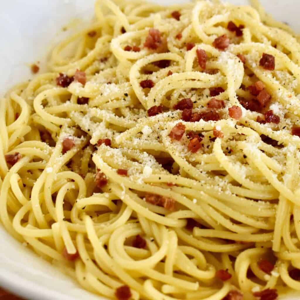 Italian pasta dinner of linguine carbonara.