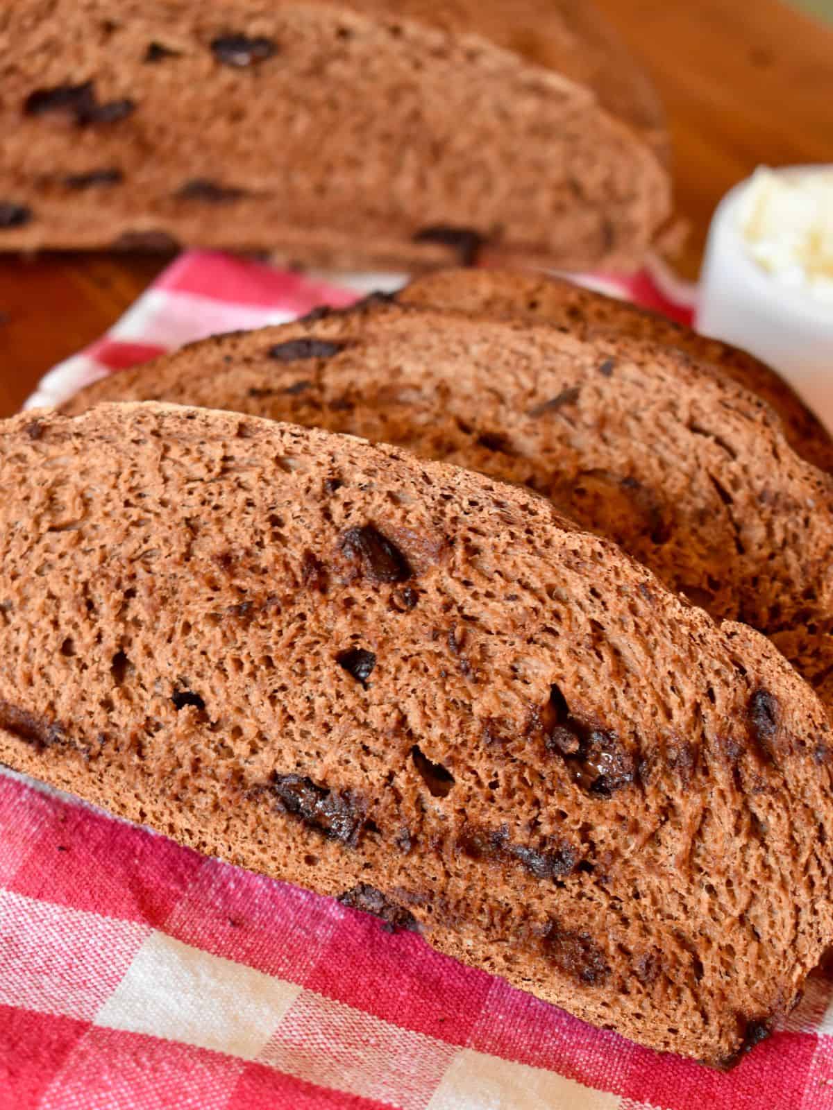 Sliced Italian Chocolate Bread on a checkered napkin. 