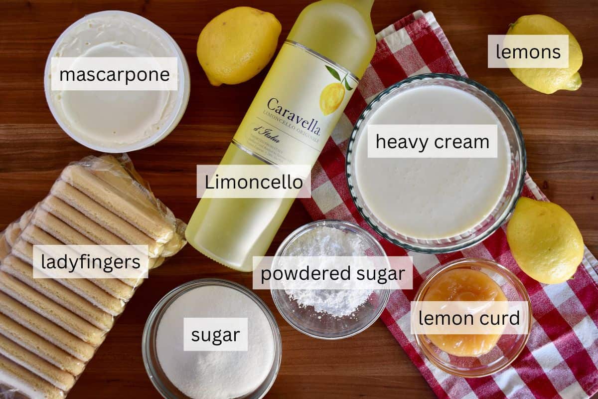 Ingredients for recipe including lemon curd, mascarpone cheese, and ladyfingers. 