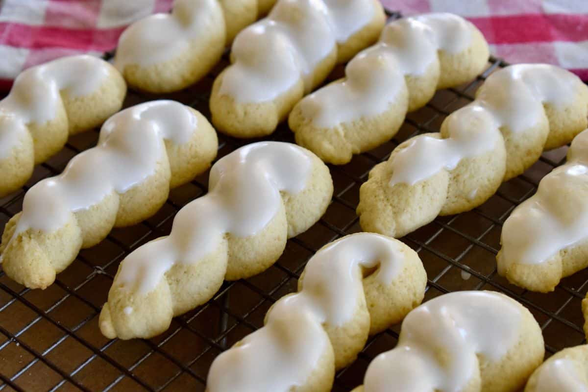 Glazed Italian Twist Cookies on a wire cooling rack. 