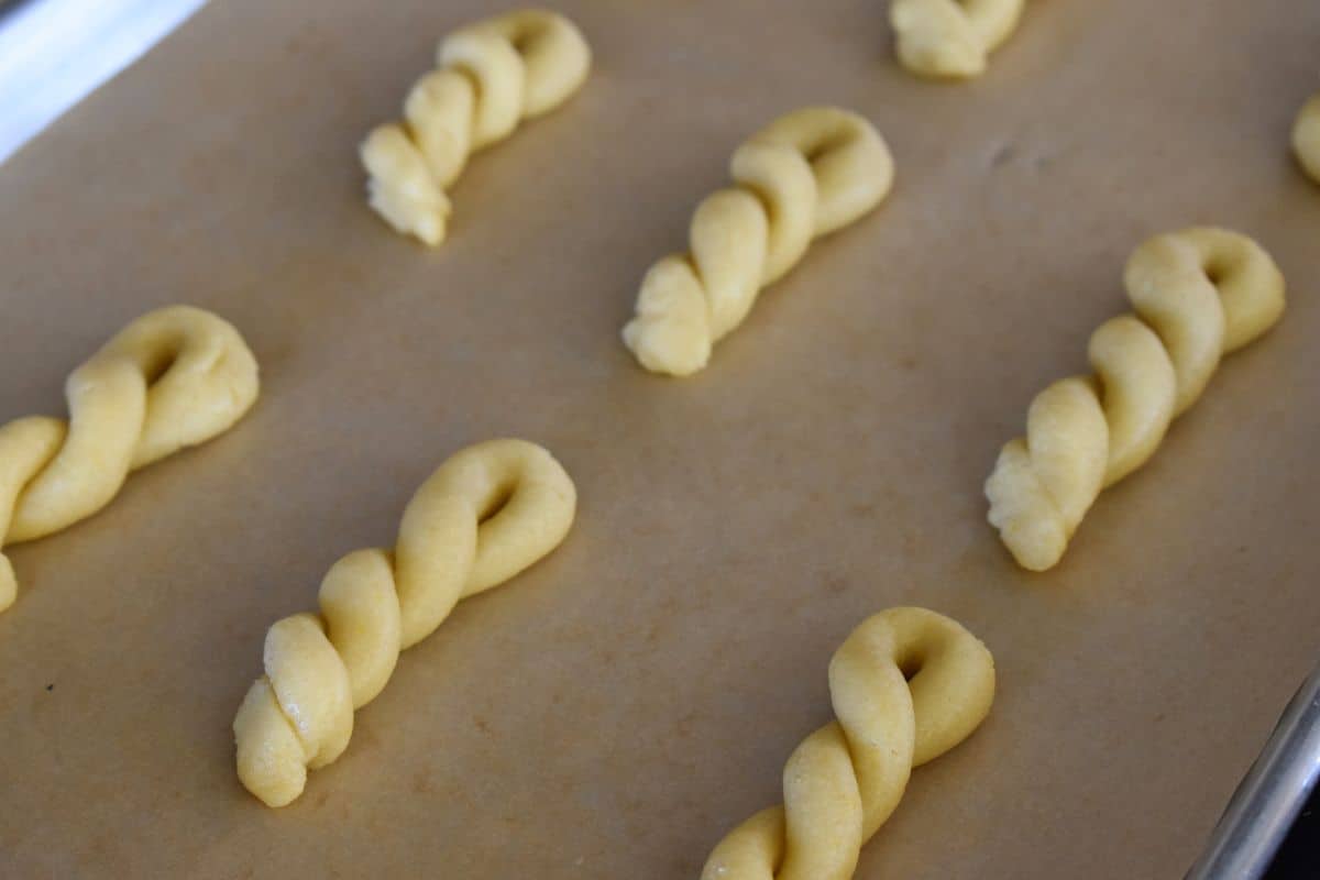 Dough formed on a parchment lined baking sheet. 