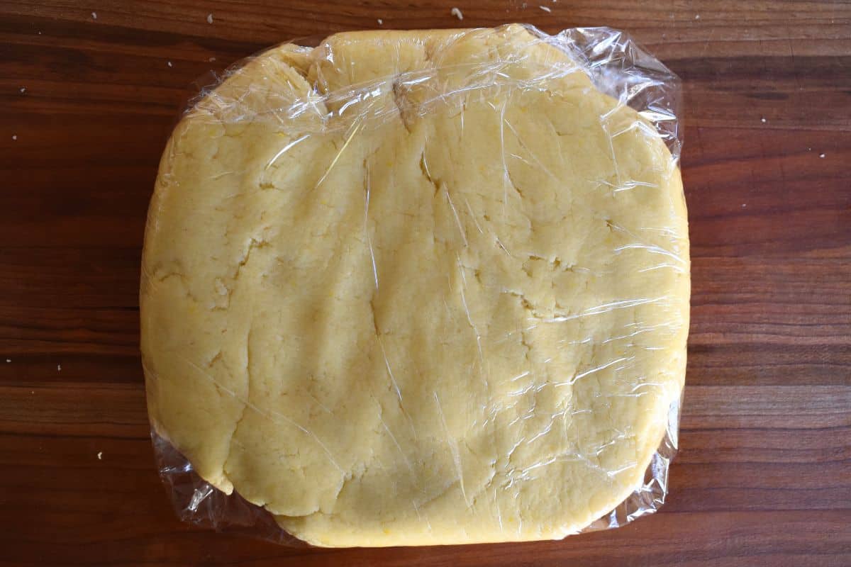 Dough wrapped in plastic wrap. 