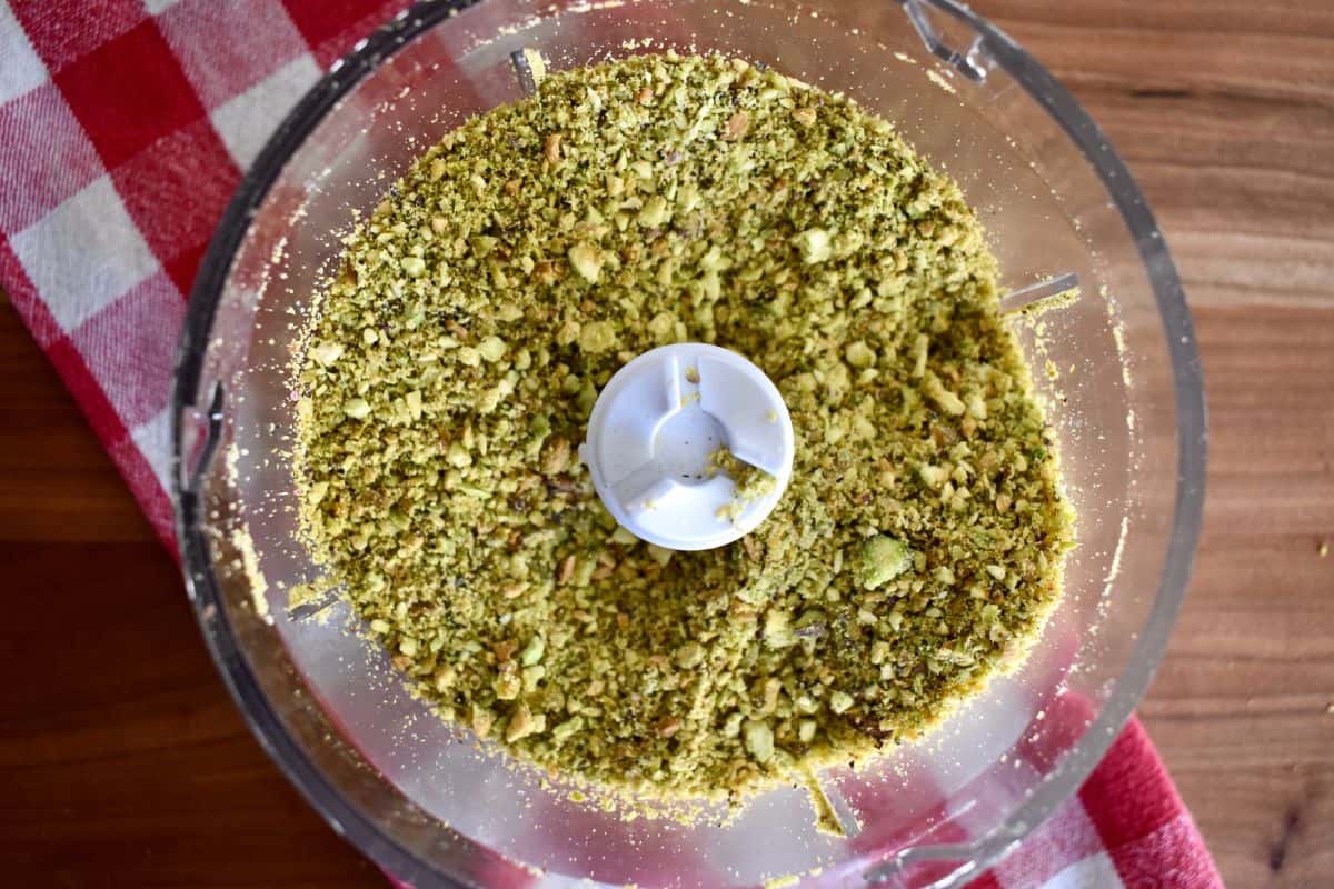 Ground pistachios in a small food processor. 