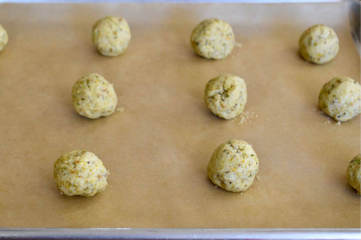 Balls of dough on a baking sheet. 