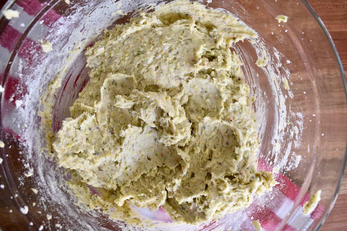 Cookie batter in a glass bowl. 