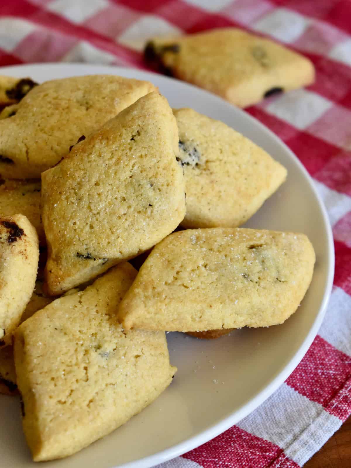 Zaleti Venetian cornmeal and raisin cookies on a white plate. 