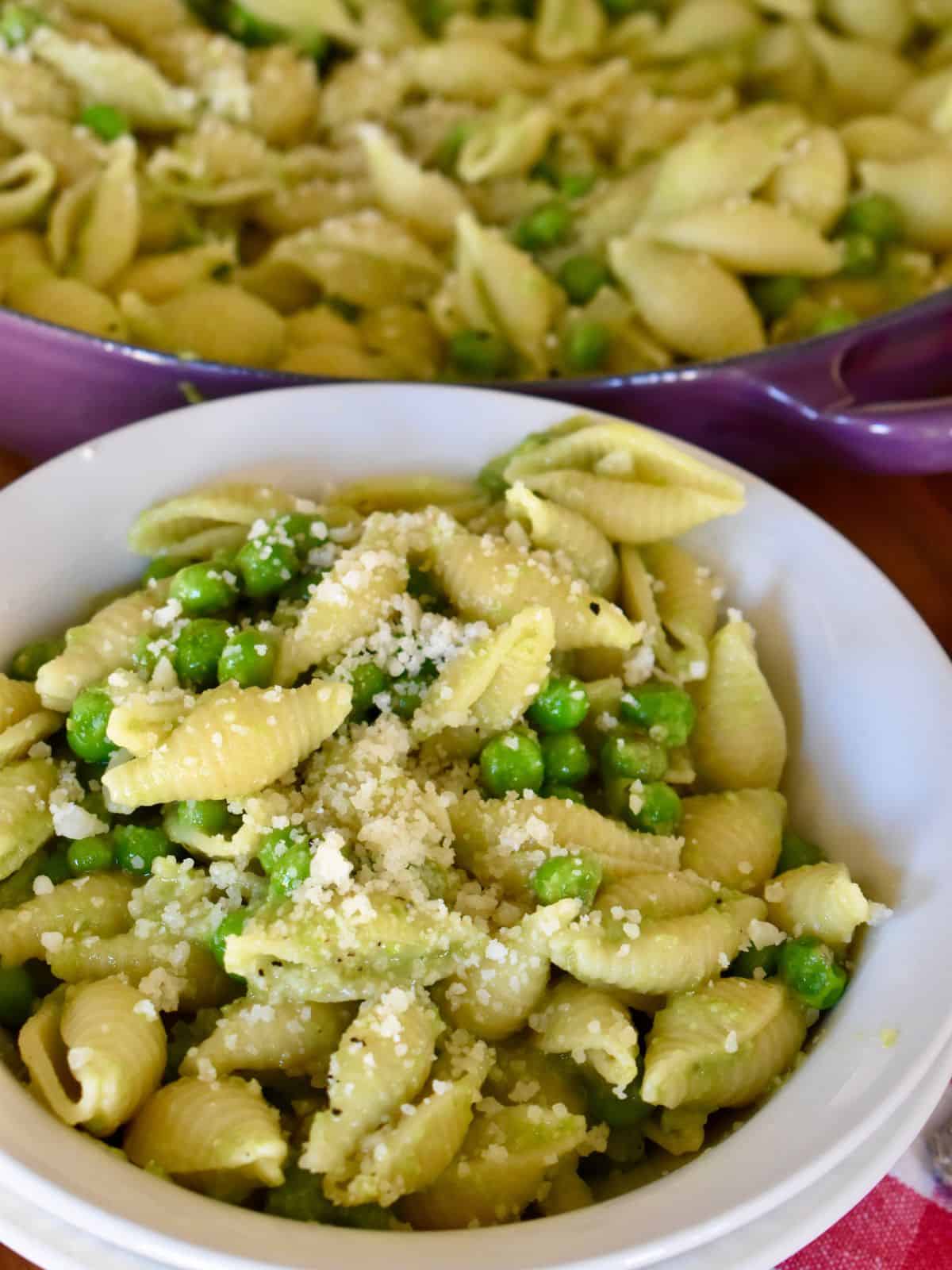 Pasta e Piselli known as pasta and peas in a white bowl. 