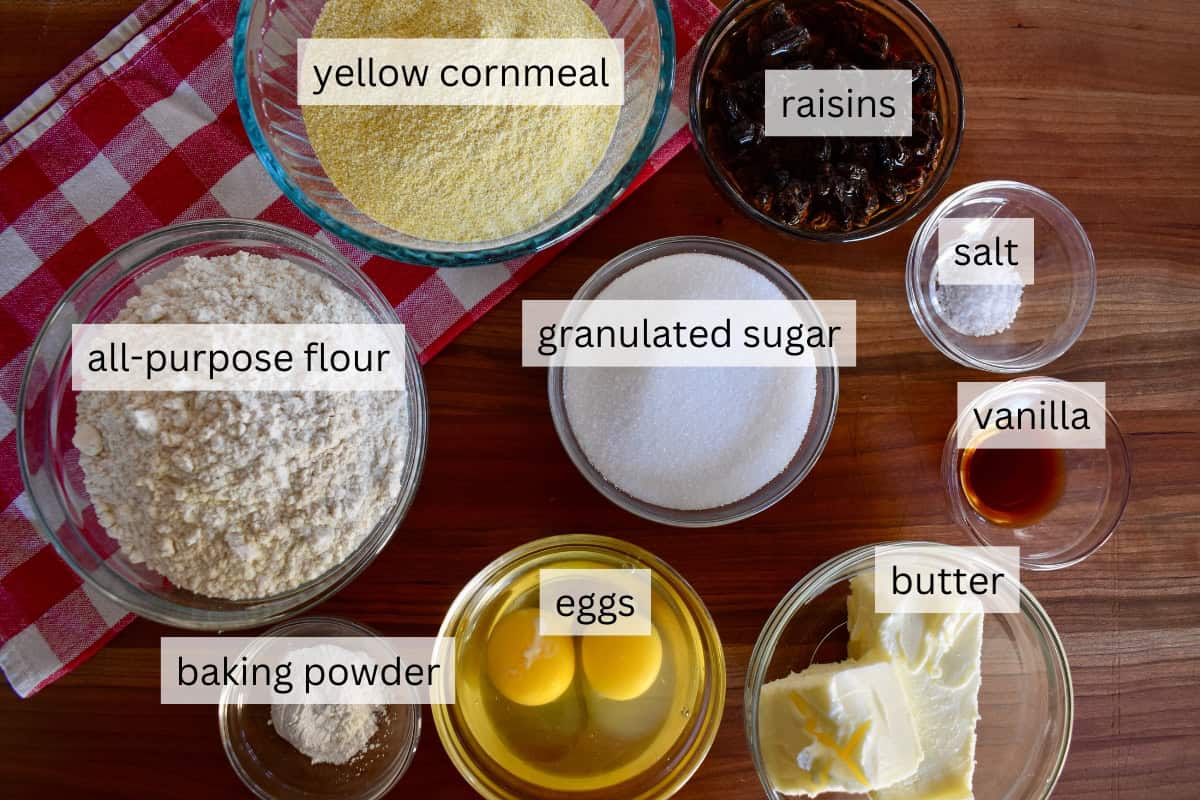 Ingredients include cornmeal, raisins, eggs, butter, sugar, vanilla, and flour. 