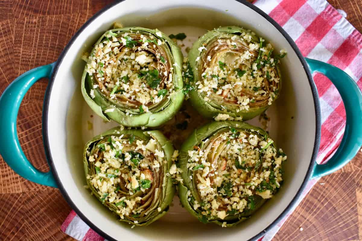 Italian Stuffed Artichokes in a large dutch oven. 