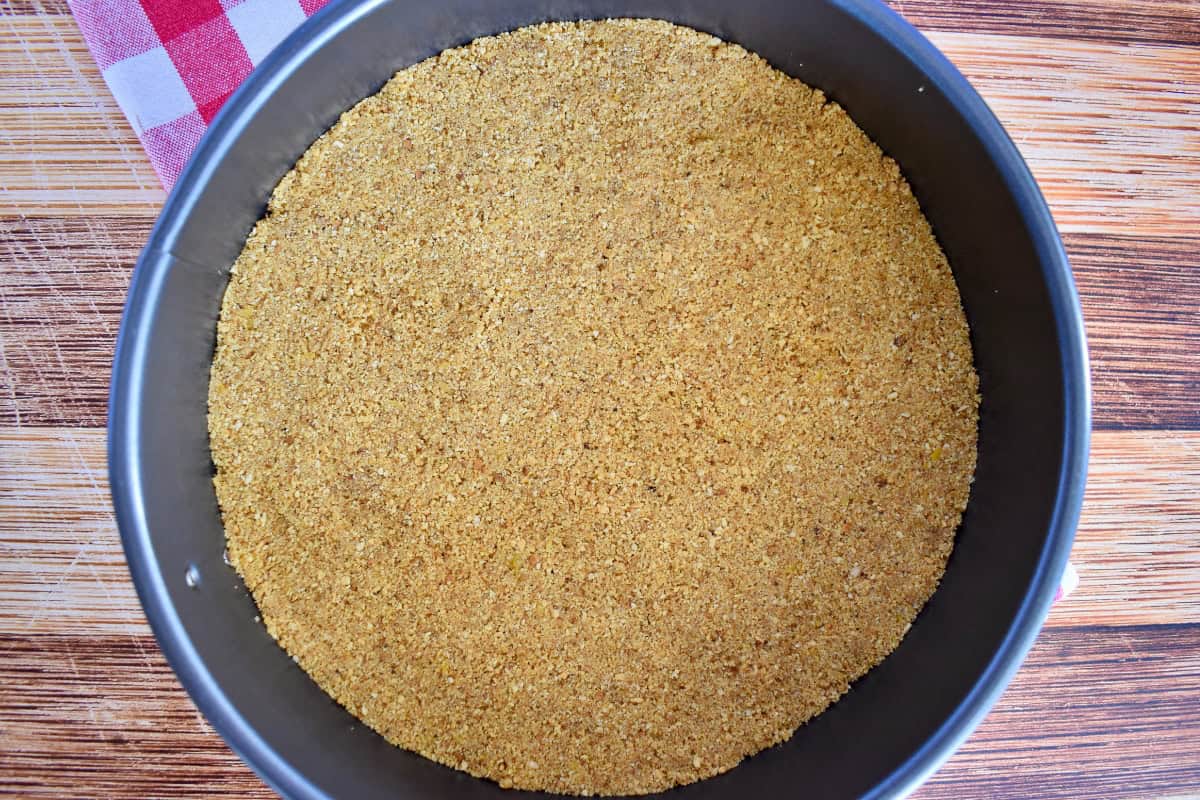 Graham cracker crumb crust pressed into a springform pan. 