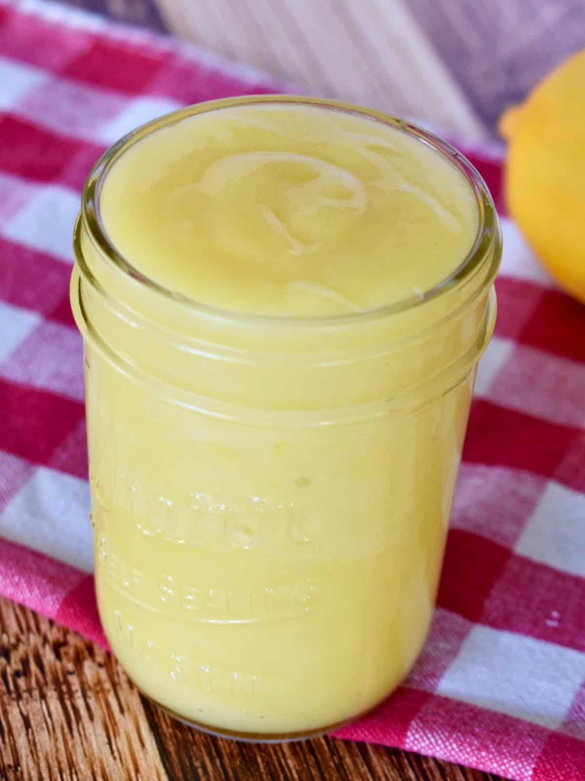 Small Batch Lemon Curd in a glass jar. 