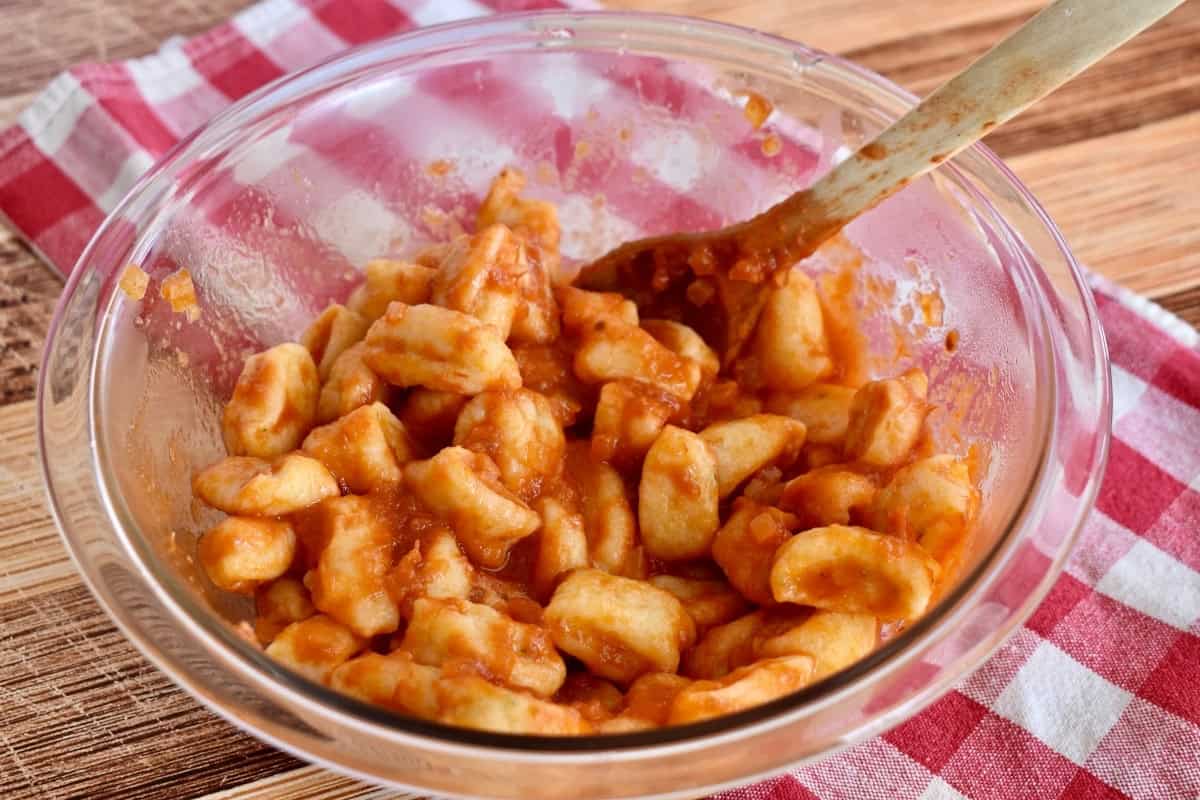 Ricotta Gnocchi tossed with butter tomato sauce. 
