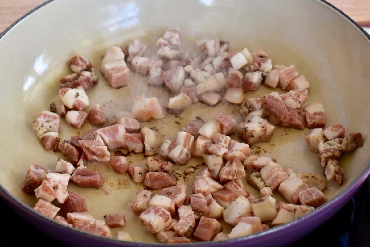 Cooked guanciale in a frying pan. 