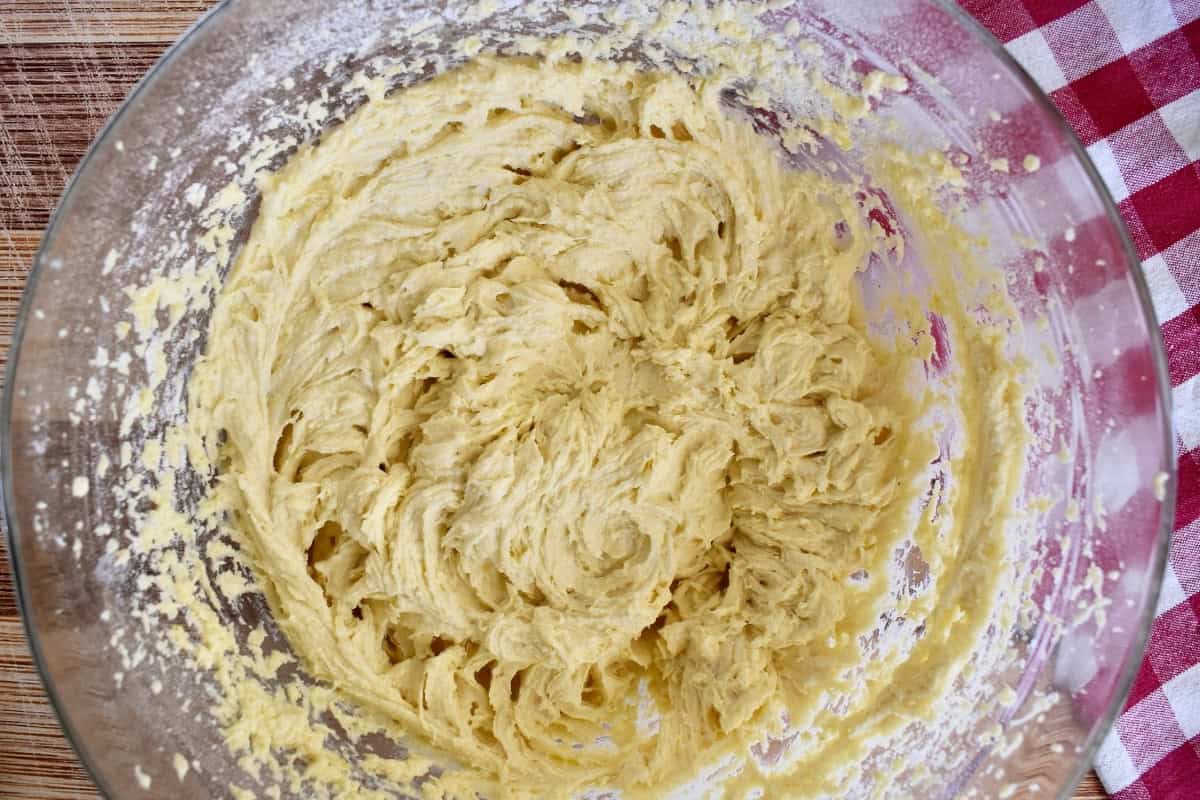 Wet ingredients mixed together in a glass bowl. 