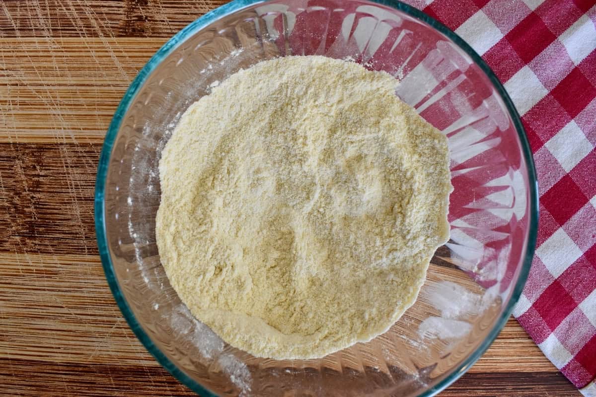 Dry ingredients mixed together in a glass bowl. 