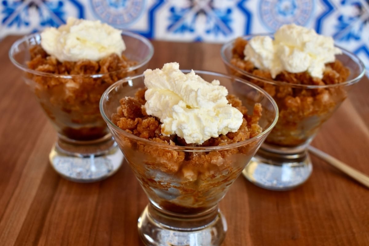 Espresso Granita in a glass cup with whipped cream on top. 