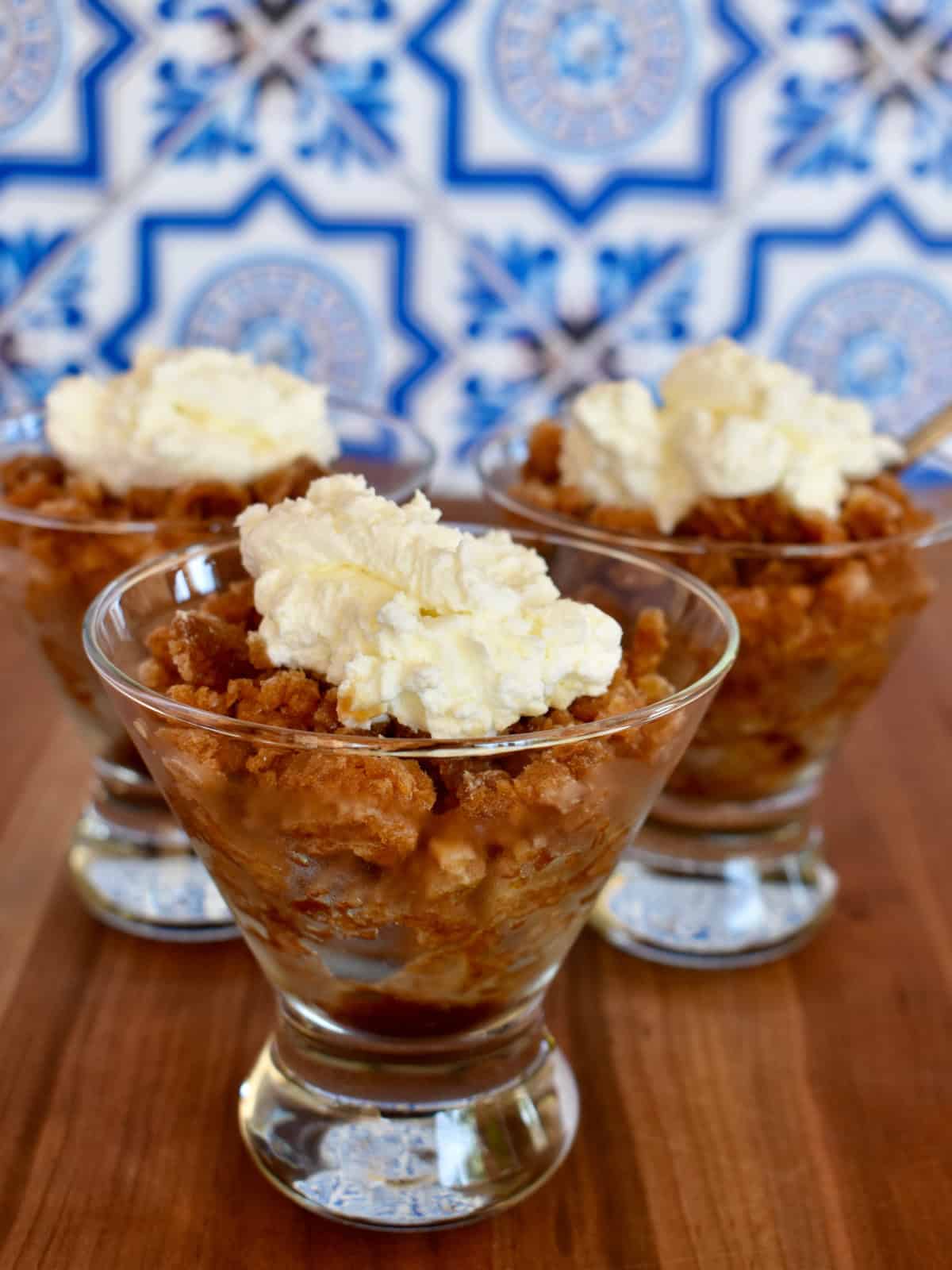 Espresso Granita in a glass cup with whipped cream on top. 