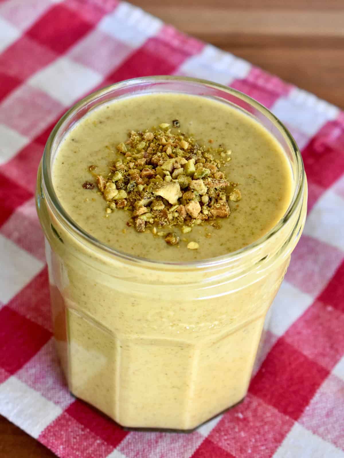 Italian pistachio cream recipe in a glass jar. 
