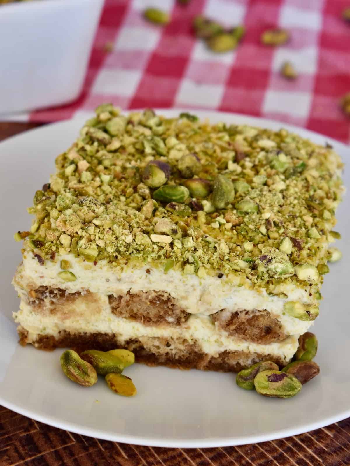 Pistachio Tiramisu on a white plate.